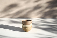  A set of 3 brown beige bowls