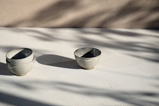 A set of 3 gray bowls