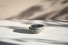  A set of 2 gray bowls