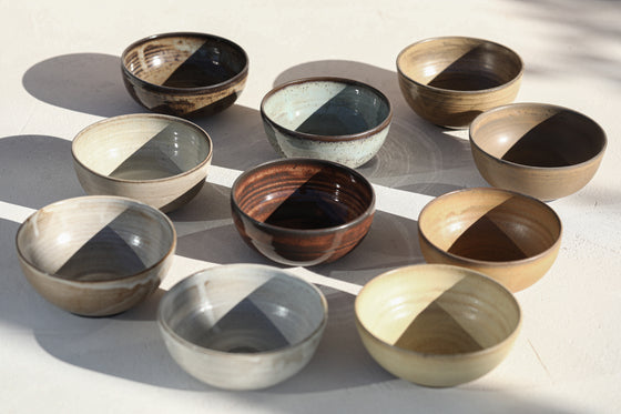 A set of 2 brown bowls