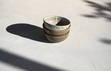  A set of 3 brown semi matt bowls