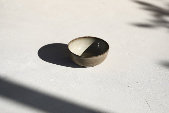 A set of 3 brown semi matt bowls