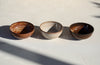 A set of 3 brown shinny bowls