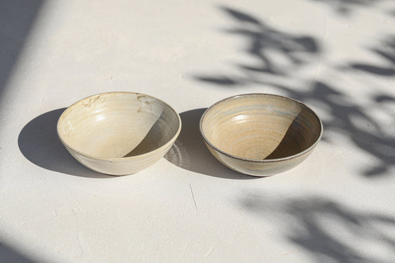 A set of 2 white/ green bowls