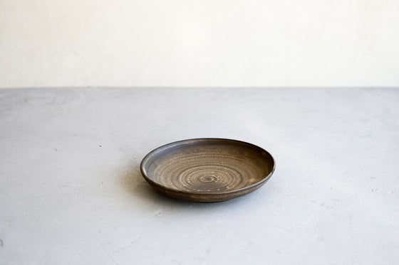 Brown shallow bowl