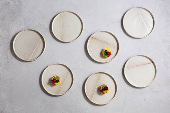 Set of White Ceramic Plates With Decorative Line